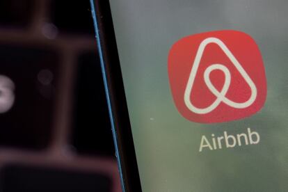 Airbnb app is seen on a smartphone in this illustration taken, February 27, 2022