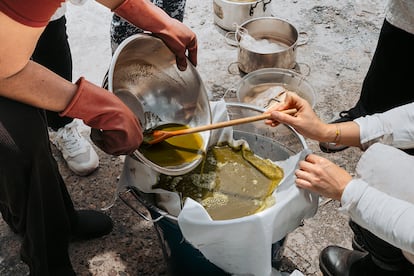 Water is mixed with coca leaf flour.