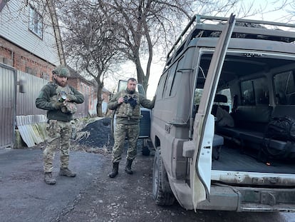Yuri and Yarloslav prepare the vehicle for a mission along the Bakhmut front.