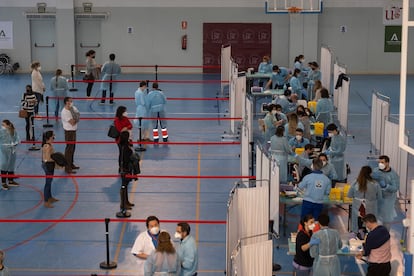 Essential workers are given the AstraZeneca vaccine in Seville.