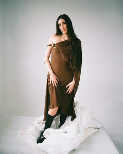 Judeline, La cantante, con vestido y botas de Gucci.