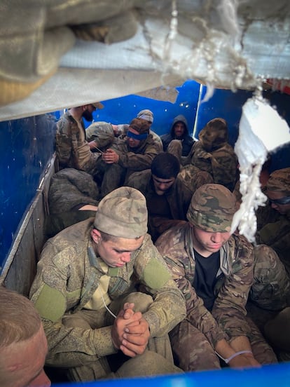 Russian prisoners of war captured by a Ukrainian special unit in Russia's Kursk region, Wednesday, August 14, in a photograph distributed by the Press Office of the Security Service of Ukraine.